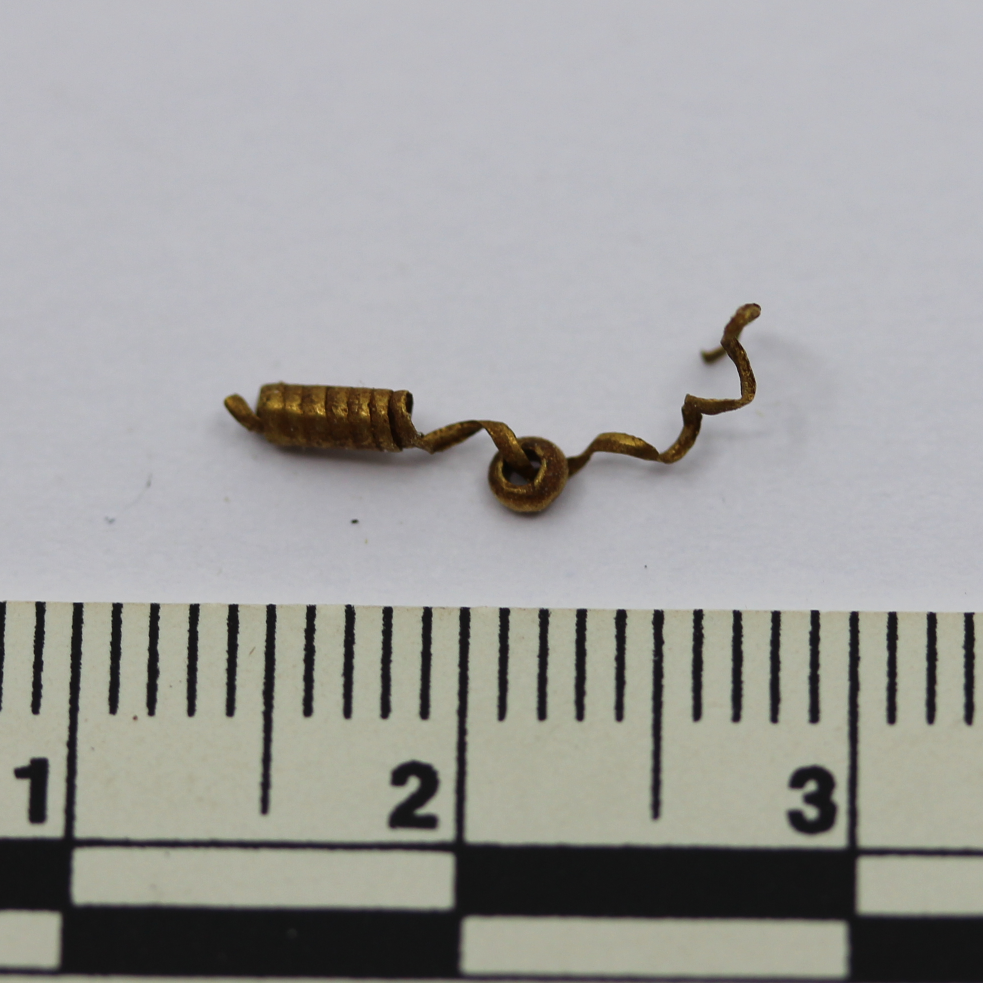 Gold wire and bead from Mapungubwe, housed at the Museum of Archaeology and Anthropology, Cambridge.